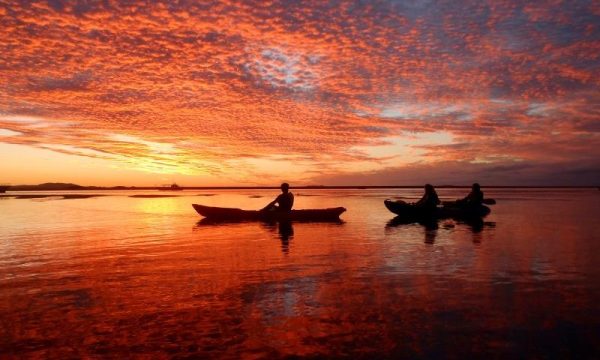 Experience one of 1770's famous sunsets from a kayak